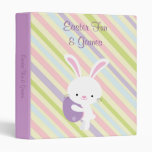 Lapin de Pâques de bande dessinée avec le classeur