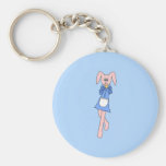 Lapin rose portant un petit gâteau porte-clef