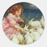 Lapins de alimentation de fille adhésifs