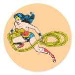 Lasso de oscillation de femme de merveille laissé autocollant rond