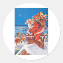 Le père noël sur le dessus de toit autocollant rond