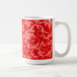 Le rétro cru tourbillonne tasse rouge de tasse de 