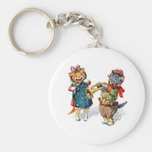 Les chats mignons jouent la trompette et la triang porte-clés