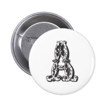 Lettre A de monogramme dans le noir Badges