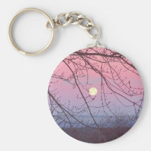 lune derrière des arbres porte-clefs