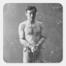 Magicien Harry Houdini se tenant dans les chaînes Autocollants