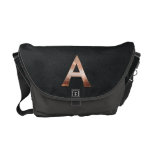 Monogramme de cuivre A Besace