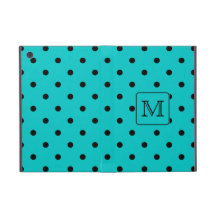 Motif de point turquoise et noir de polka. Monogra