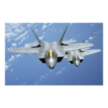 Mouche de deux F-22 Raptors au-dessus de l'océan p Photographies D’art