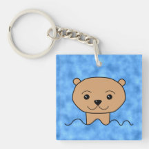 Natation de loutre porte-clef