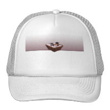 Panier en osier avec des chatons casquette