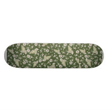 Planche à roulettes verte de papillon