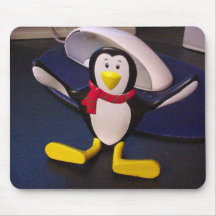Poupée de pingouin tapis de souris