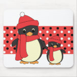 Prise du petit pingouin pour une promenade tapis de souris