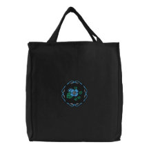 Sac brodé par fleur bleue