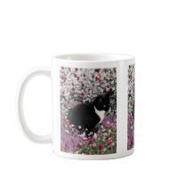 Taches de rousseur dans la tasse des fleurs II - c