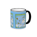 Tasse heureuse de marguerites d'abeille