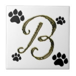 Tuile de monogramme d'empreinte de patte carreaux