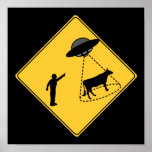 Vache à signe de route et affiche d'UFO
