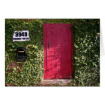Vignes avec la porte rouge carte de vœux
