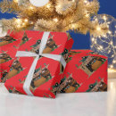 Zoek naar oude cadeaupapier Kerstman