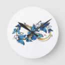 Recherche de papillon bleu horloges Blanc