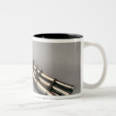 Recherche de pistolet tasses École