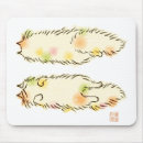 Recherche de pelucheux tapis souris Chat