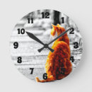 Recherche de chat tigré orange horloges Chats