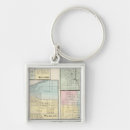 Recherche de six porteclés Lithographié