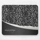 Recherche de taches noires tapis souris Monogramme