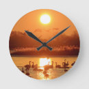 Recherche de silhouette de coucher du soleil horloges Silhouettes