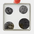 Recherche de pièce de monnaie ornements Tête