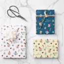 Recherche de petit chien papier cadeau Noël