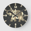 Recherche de éléphant noir horloges Animaux