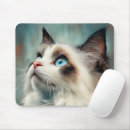 Recherche de oeil bleu tapis souris Animal