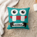 Recherche de petits monstres coussins Nom
