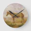 Zoek naar olie op klokken Paarden