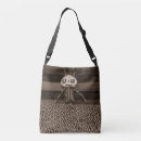 Recherche de poupées sacs Mignon