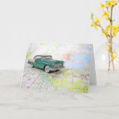 1955 : Une voiture sur une carte routière (Fleur jaune)