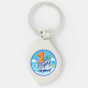 1e vlucht kleurrijk vliegtuig souvenir sleutelhanger