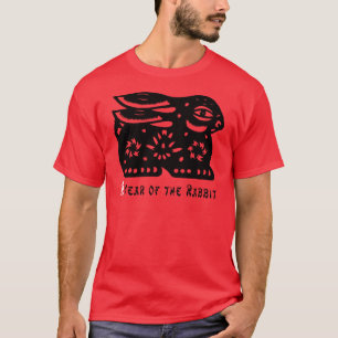2011 ans du T-shirt foncé coupé par papier de