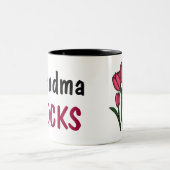 2 Couleurs La grand-maman de CB bascule la tasse (Centre)