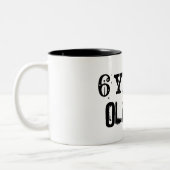 6 jaar oud tweekleurige koffiemok (Links)