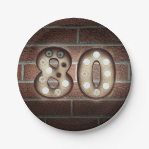 80ste verjaardag lichtbak aan bakstenen muur papieren bordje