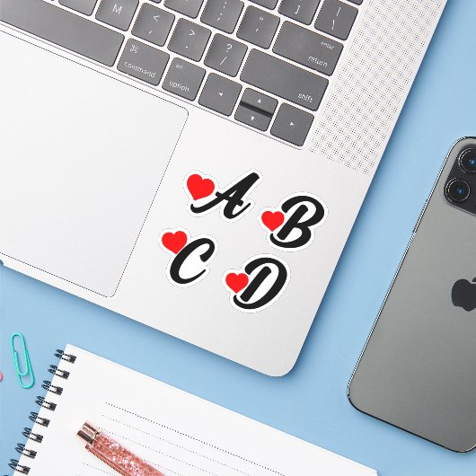 A B C D Letters met harten Sticker (Laptop met iPhone)