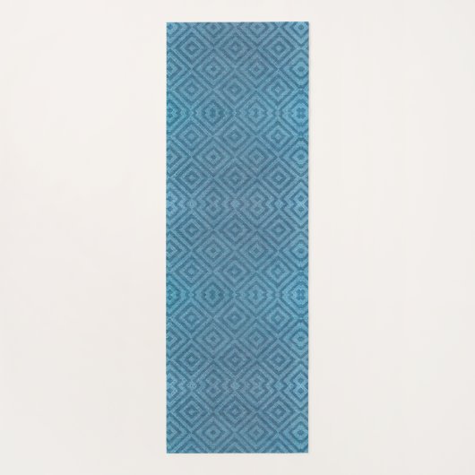 A blue yoga mat with a subtle geometric pattern (Achterkant)