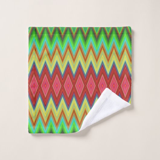 A colorful, geometric-patterned towel set hangs (Gant de toilette)