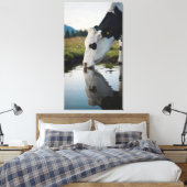 A cow drinks water in a natural stream canvas afdruk (Insitu (Slaapkamer))