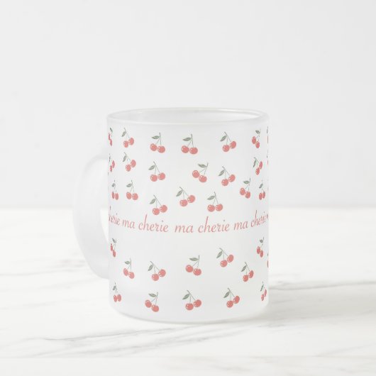 A frosted glass mug with cherry pattern  (Devant gauche)